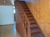 Flur mit Holztreppe